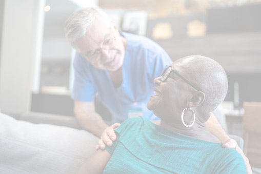 Doctor and patient talking at home